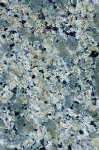 Granite-block counters and granite-tile floors prevent the outgassing of harmful toxins often found in man-made surfaces. And a recycling area in the basement helps keep household waste out of the kitchen